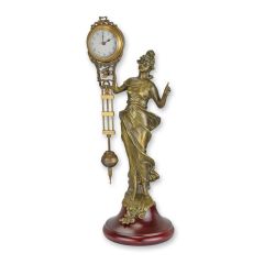 Tafelaarsklok Mystérieuse met goudkleurig vrouwenfiguur en zichtbare pendule