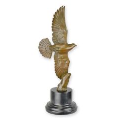 Bronzen sculptuur van een vliegende duif