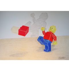 Who is kicking the blocks, the Lego figure or shadow?