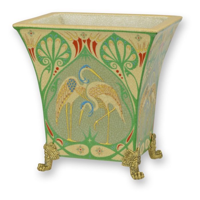 Porseleinen plantenbak met vogelmotieven en bronzen pootjes